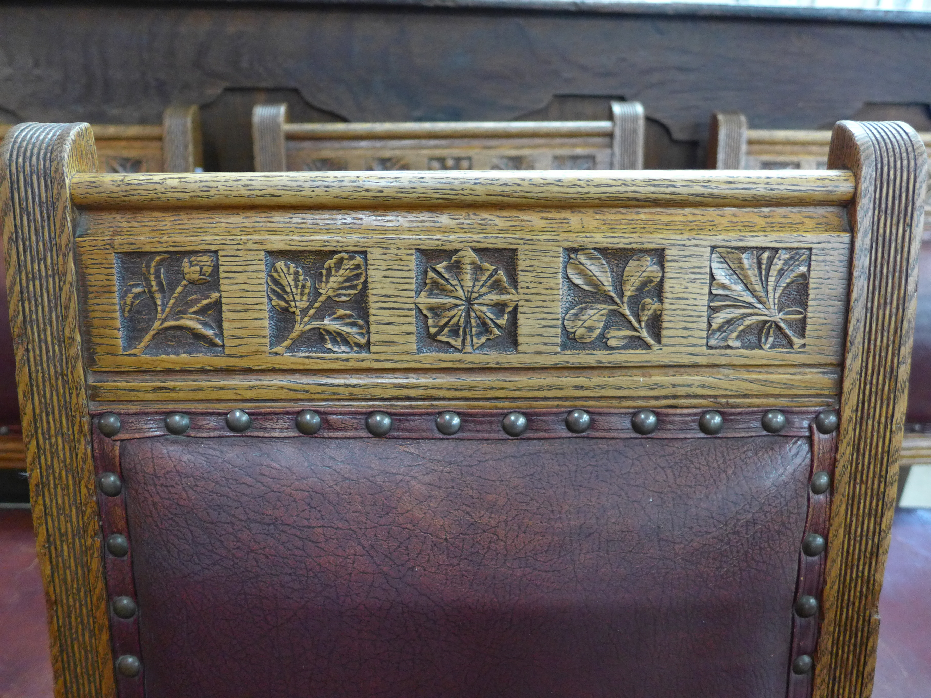 A set of ten Victorian oak and leather dining chairs, made by Plunknett & Steevens, - Image 5 of 7