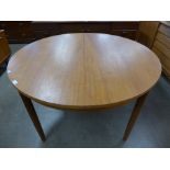 A Danish teak extending dining table