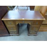 An oak kneehole desk