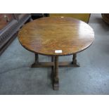An oak circular coffee table