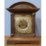 A 19th Century German beech mantel clock