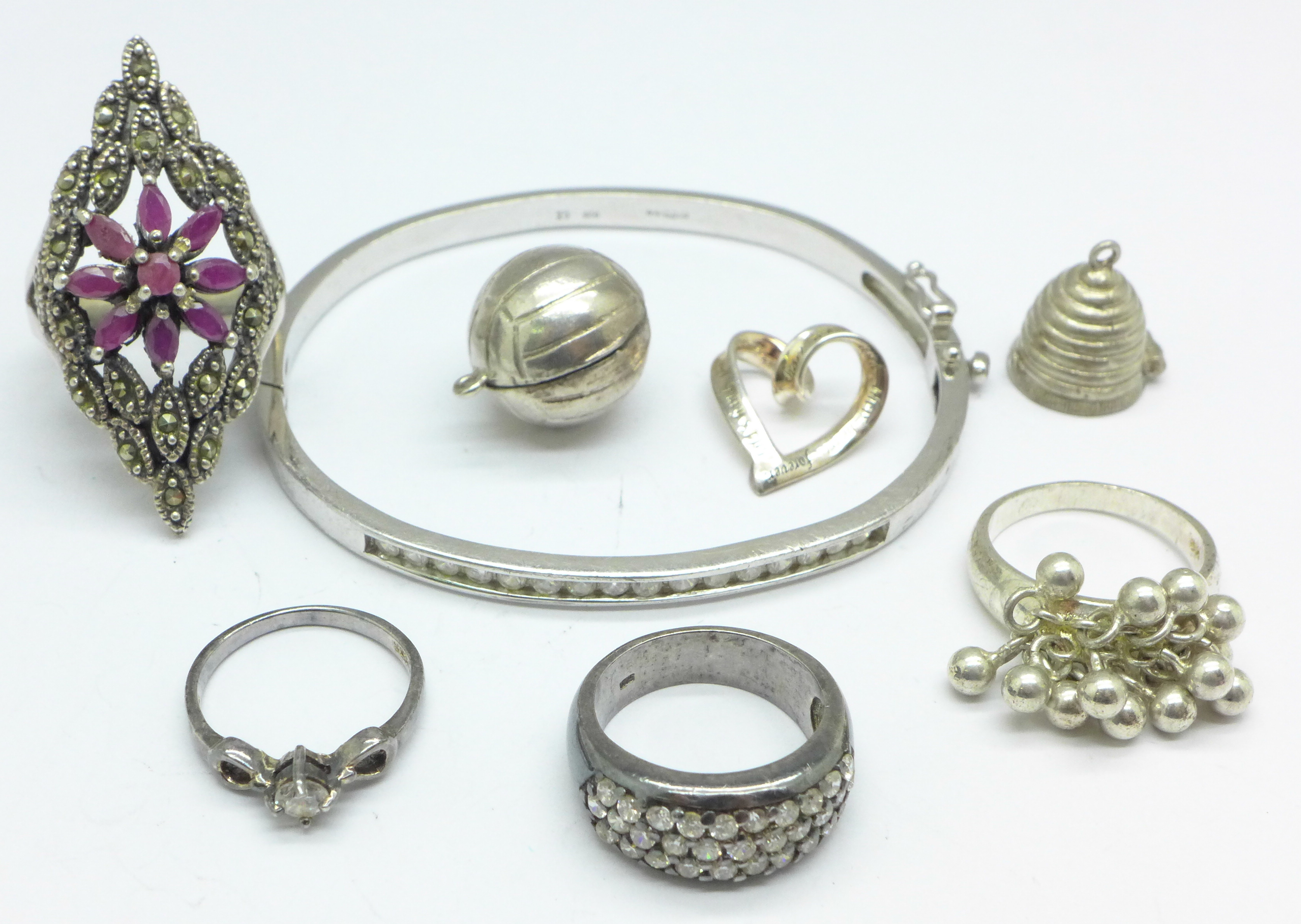 Jewellery including a football charm,