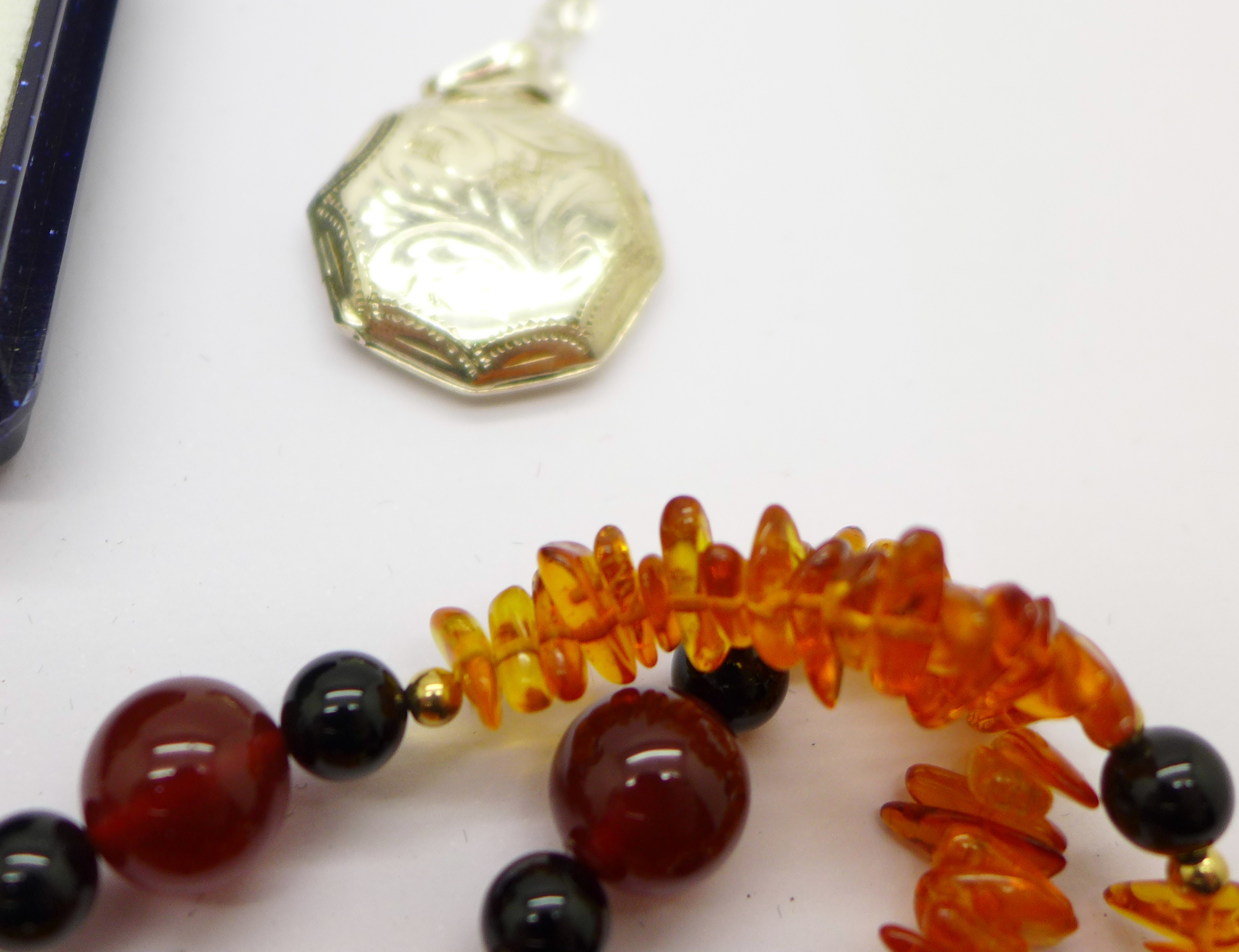 Amber jewellery, a silver locket and chain, two rings, - Image 3 of 3