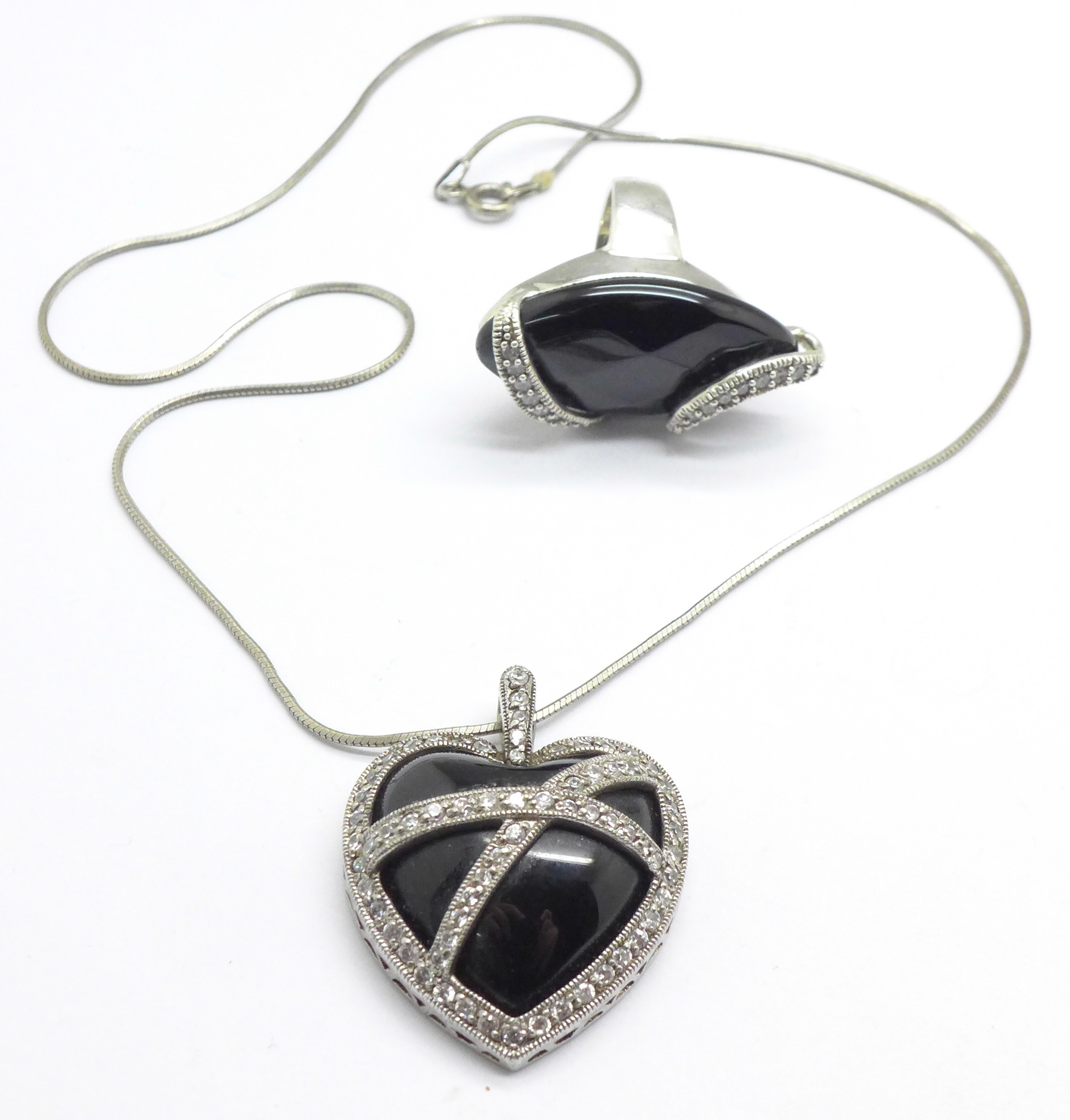 A silver pendant and chain and a 925 silver ring,