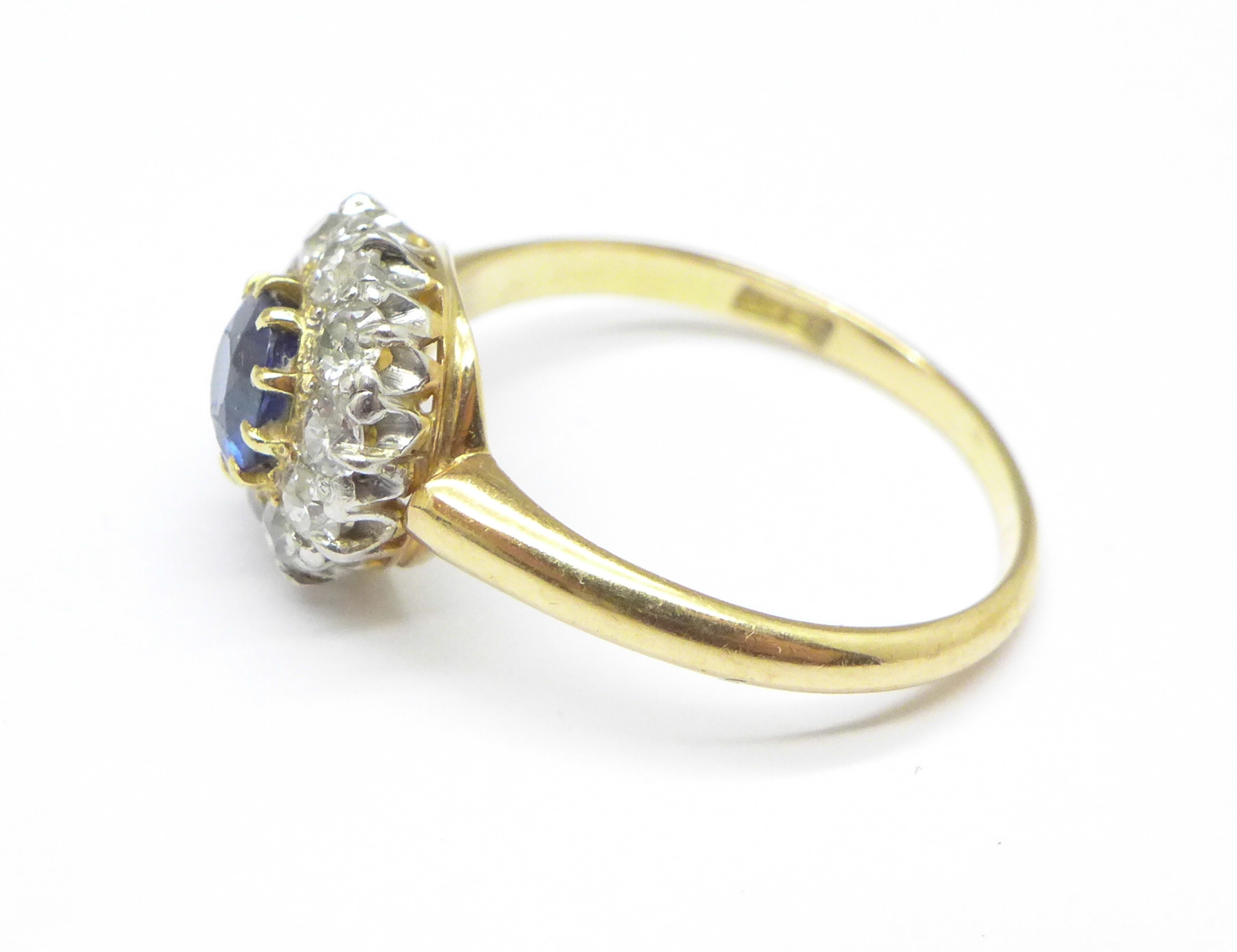 An 18ct gold, sapphire and diamond cluster ring, 4. - Image 2 of 2