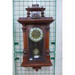 A mahogany Vienna wall clock