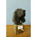 A French style bronze dog's head on grey marble socle