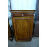 A George III inlaid oak splay front hanging corner cupboard