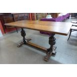 A carved oak refectory table