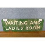 A Waiting and Ladies Room enamel sign