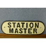 A cast iron Station Master sign