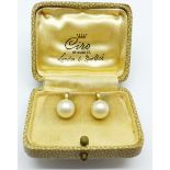 A pair of 9ct gold mounted Ciro pearl earrings,