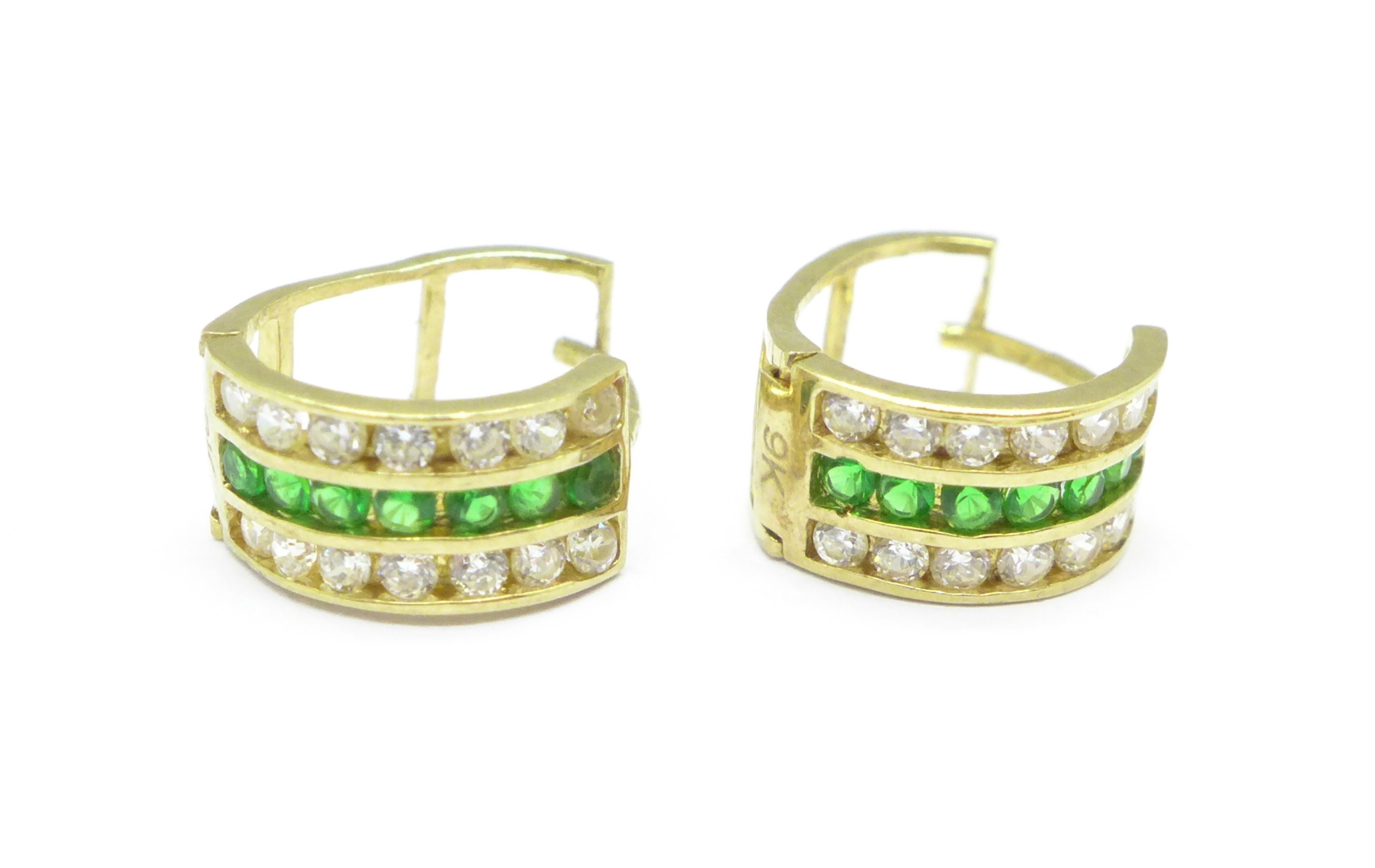 A pair of 9ct gold green and white stone earrings, 1.