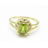 A 9ct gold, peridot and diamond ring, 1.