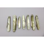 Seven silver and mother of pearl pocket knives