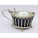 A silver mustard pot with blue glass liner, Birmingham 1904,