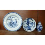 An 18th Century Chinese blue and white dish and plate, and a moon flask, a/f, chips to the rims,