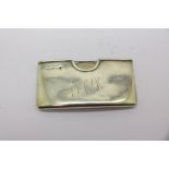 A silver card holder,