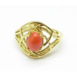 A silver gilt, cabochon set ring,