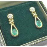 A pair of 9ct gold, emerald and diamond earrings, 2.