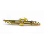 A 15ct gold and diamond brooch, 3.