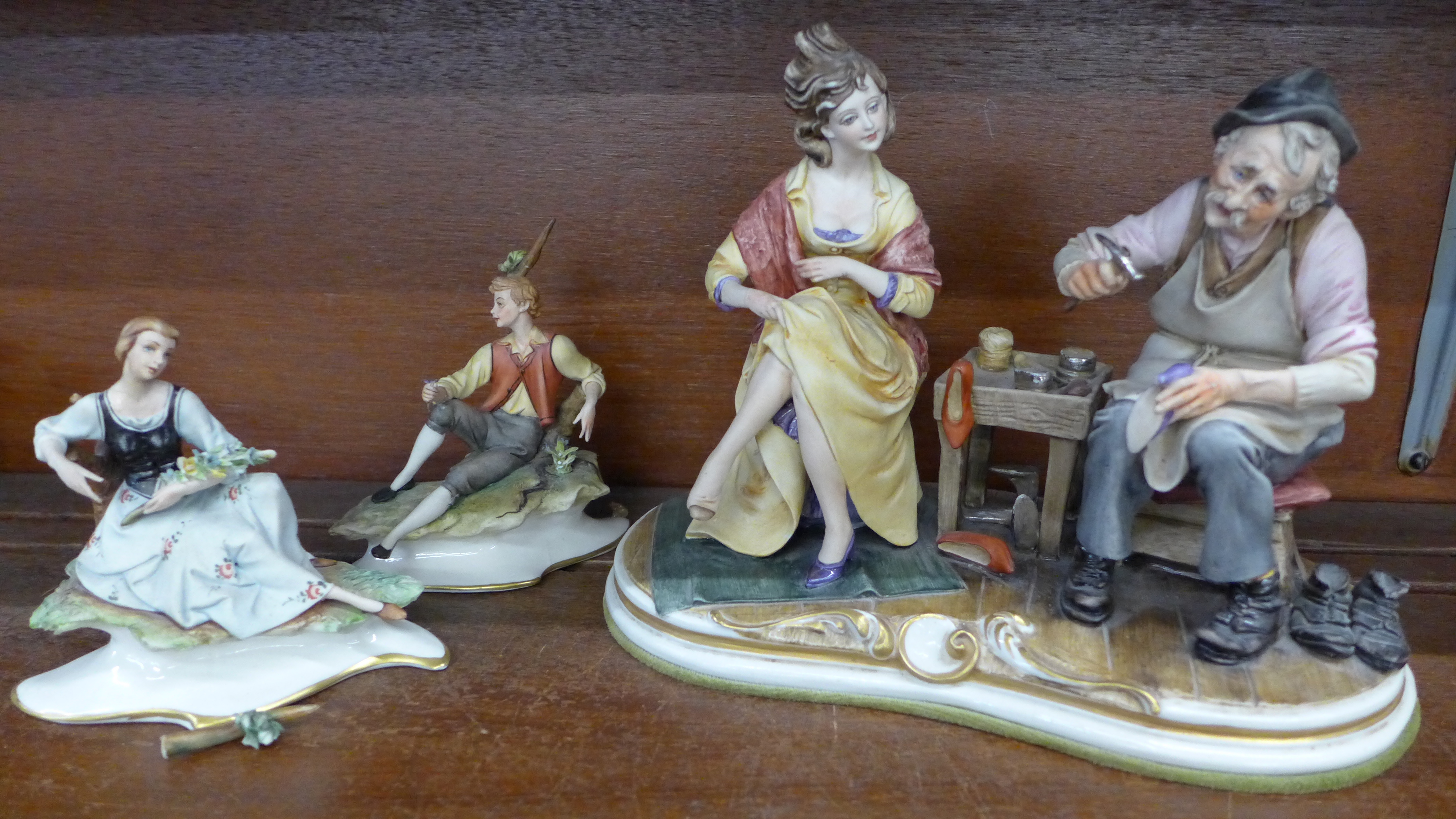 A Capodimonte figure, The Cobbler, signed B.