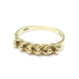 A 9ct gold knot ring, 2.