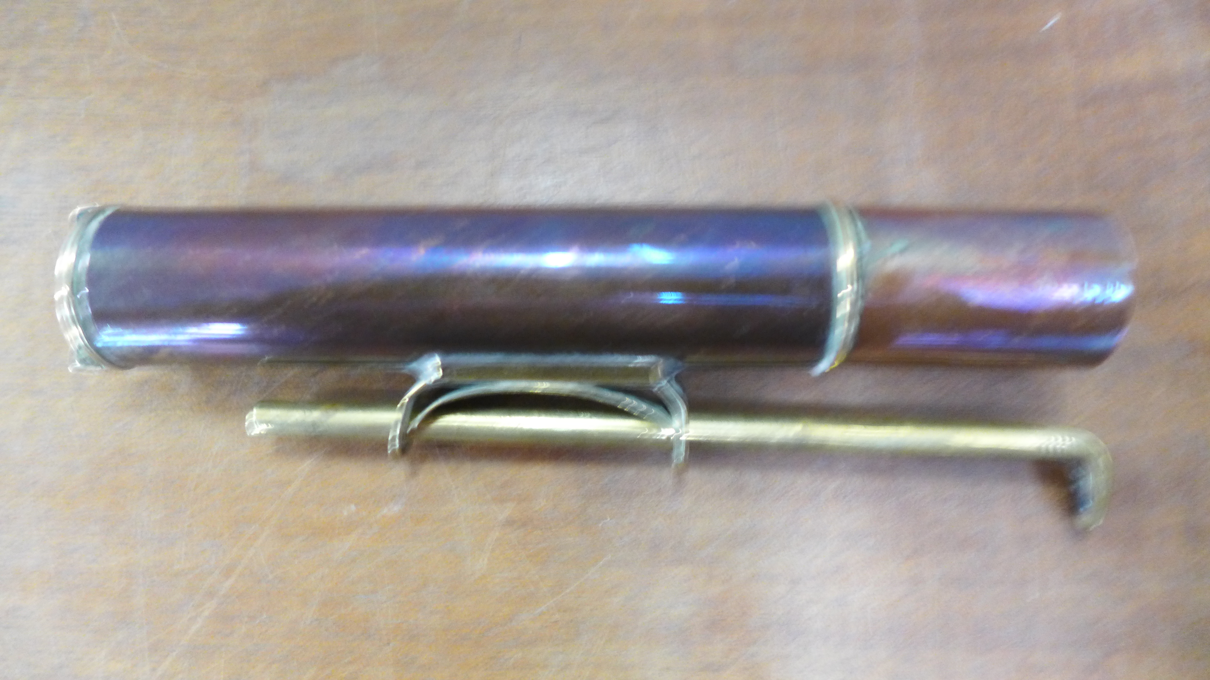 An antique portable blow burner,