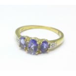 A 9ct gold, tanzanite and diamond ring, 2.