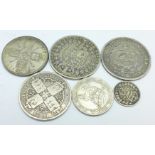 A Victorian Gothic head florin, a Boer 1896 2½ shilling, an 1892 Victorian half crown,