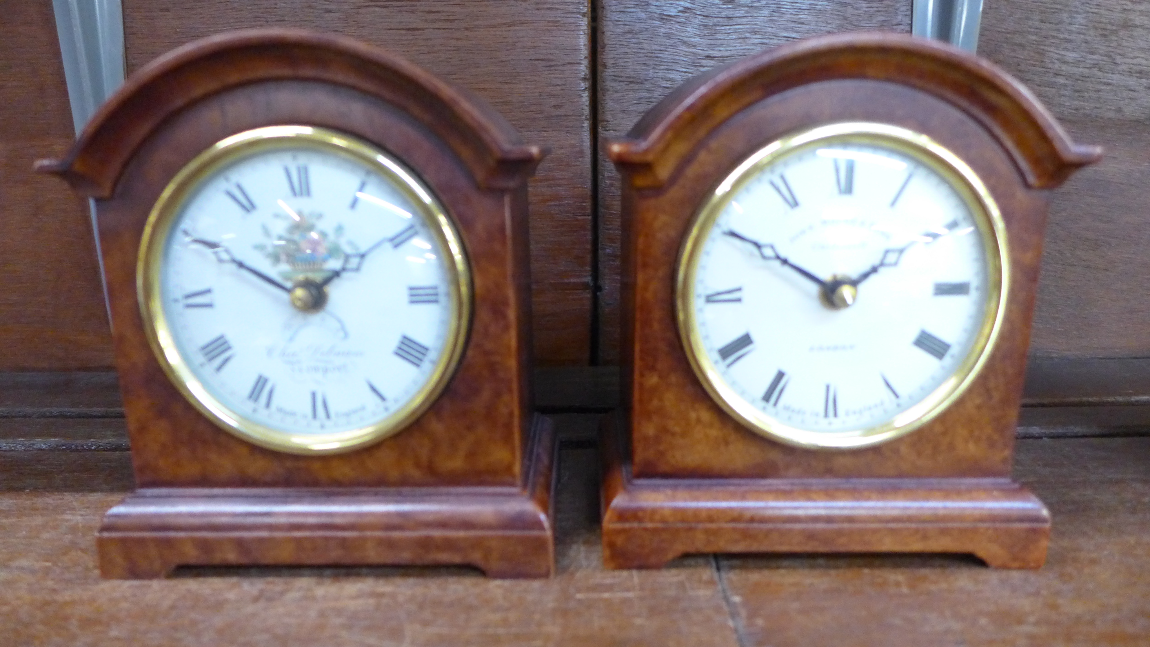 Two modern arch topped mantel clocks