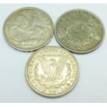 A 1921 Liberty dollar and two crowns,
