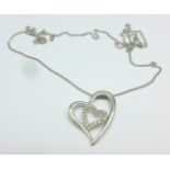 A 9ct white gold and diamond pendant and a 9ct white gold chain,