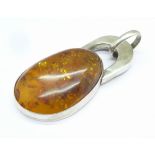 A large amber set pendant