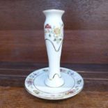 A candlestick marked Zsolnay Hungary,