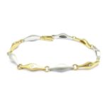 A platinum and 18ct gold, diamond set bracelet, marked 950 and 750, 14.
