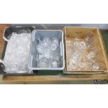 Three boxes of crystal drinking glasses, other drinking glasses and two decanters,