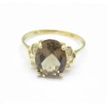 A 9ct gold, smoky quartz and diamond ring, 1.