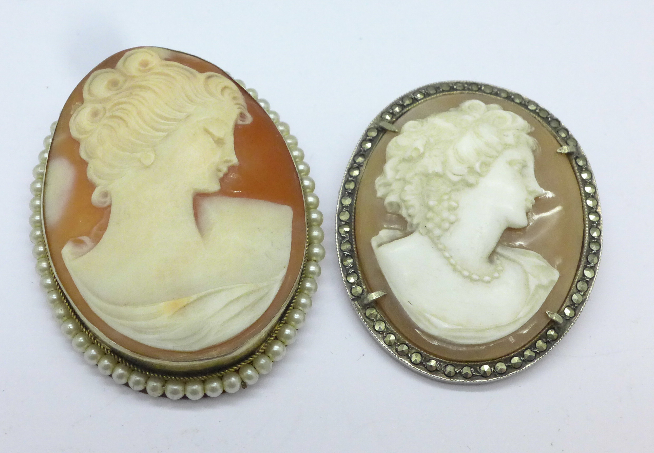 Two silver cameo brooches or pendants