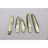 Five pocket knives with silver blades and decorated mother of pearl handles