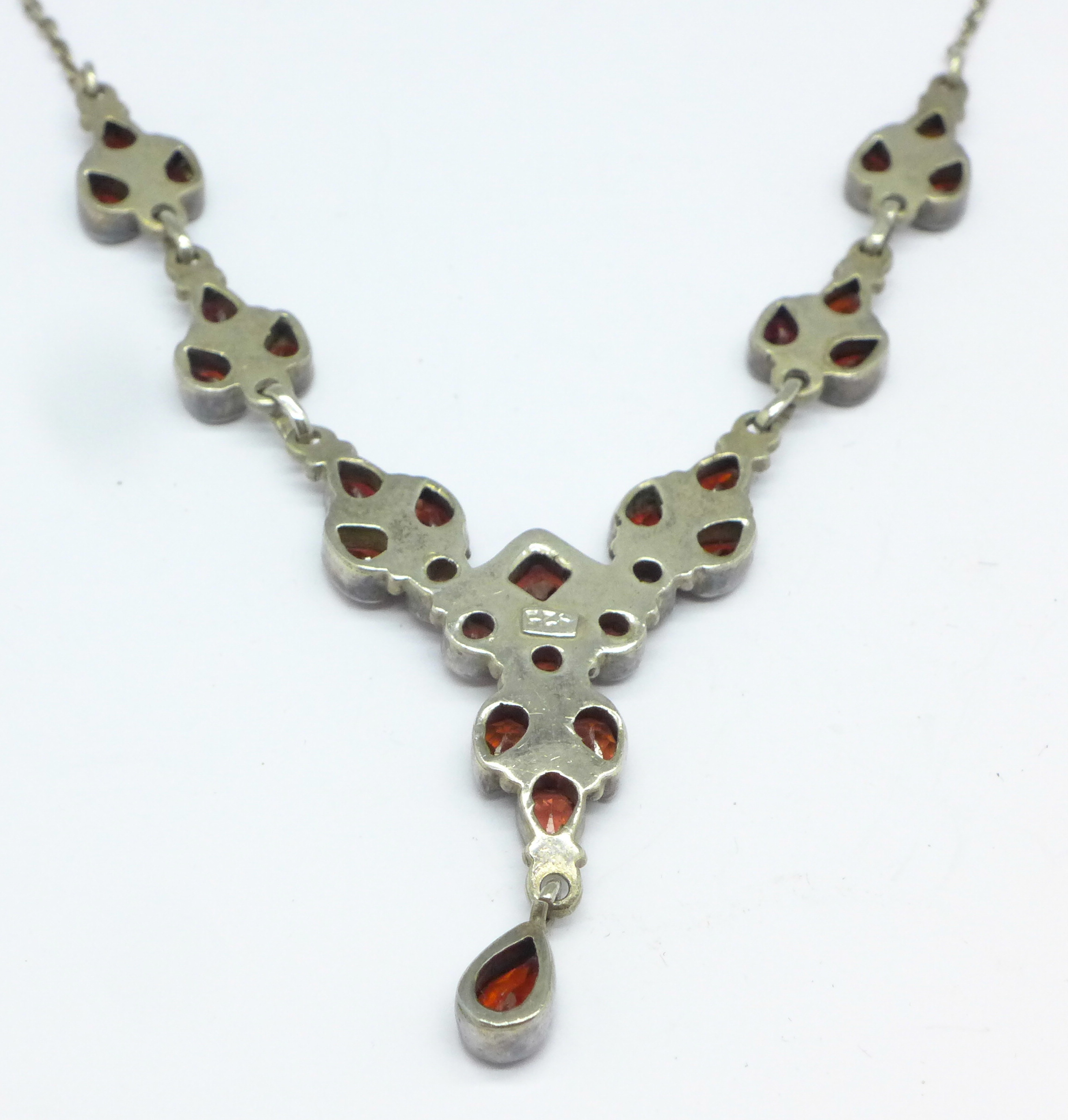 A silver and garnet necklet marked 925 - Image 3 of 4