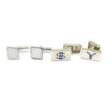 Two pairs of silver cufflinks including one with money symbols,