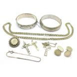 Two silver bangles, two crucifix, a pair of silver cufflinks, etc.