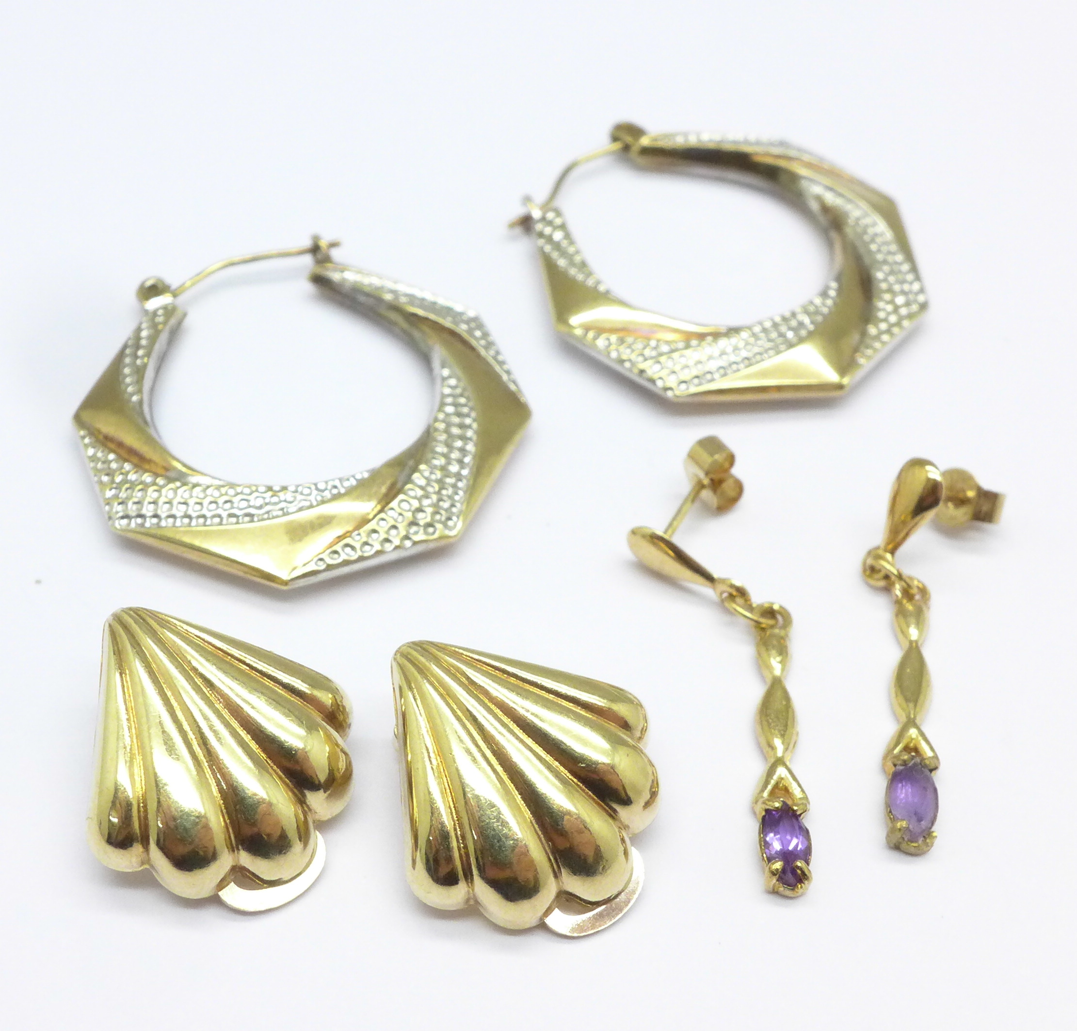 Three pairs of yellow metal earrings, 4.