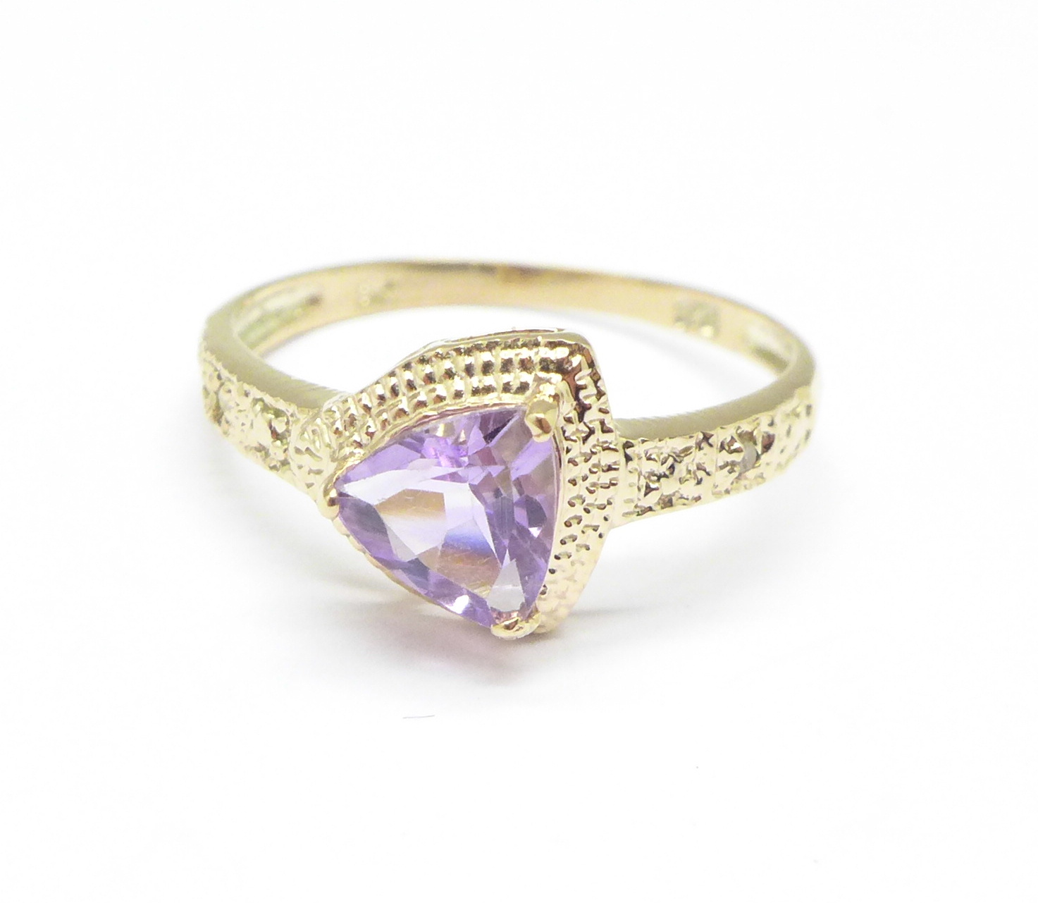 A 9ct gold, amethyst and diamond ring, 1.