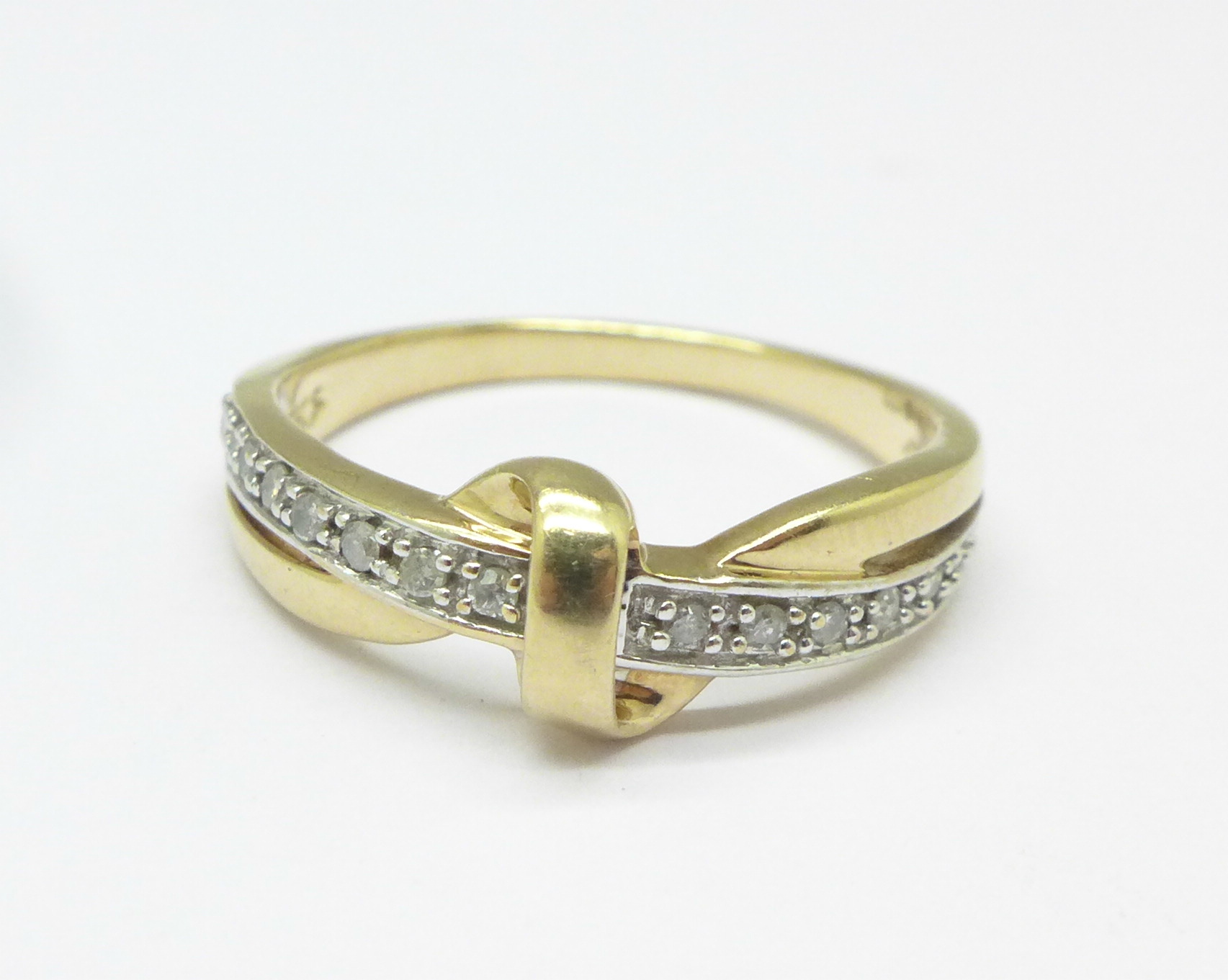 A 9ct gold and diamond ring, 2.