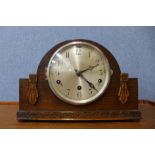 An Art Deco oak mantel clock