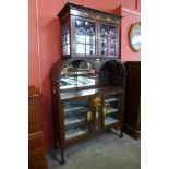 An Arts and Crafts inlaid mahogany side cabinet,