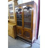 An early 20th Century oak barleytwist bookcase,