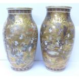 A pair of Satsuma vases, one repaired,